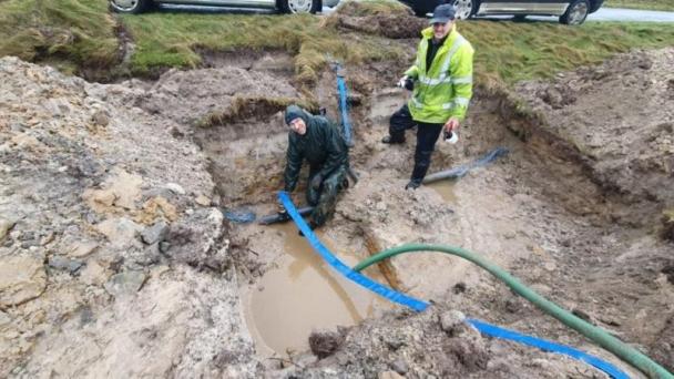 Water pipes connect Orkney island residents to broadband network
